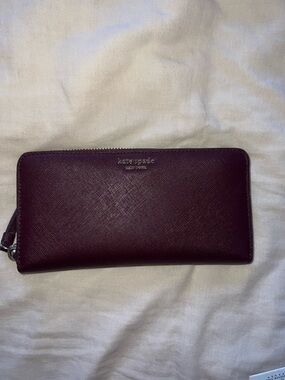 kate spade Plum/ Maroon Saffiano Zip Wallet with Gold Logo